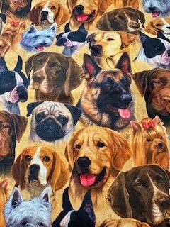 Dog Faces on Tan Background
